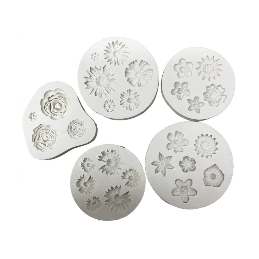 molde silicona gemas (7) Molde de silicona mini flores para fondant - Imagen 1